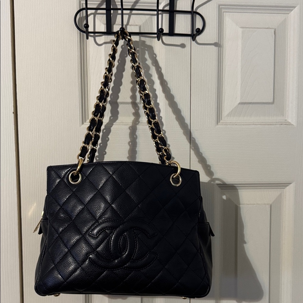 CHANEL Vintage Petite Shopping Tote in black caviar leather with gold hardware.